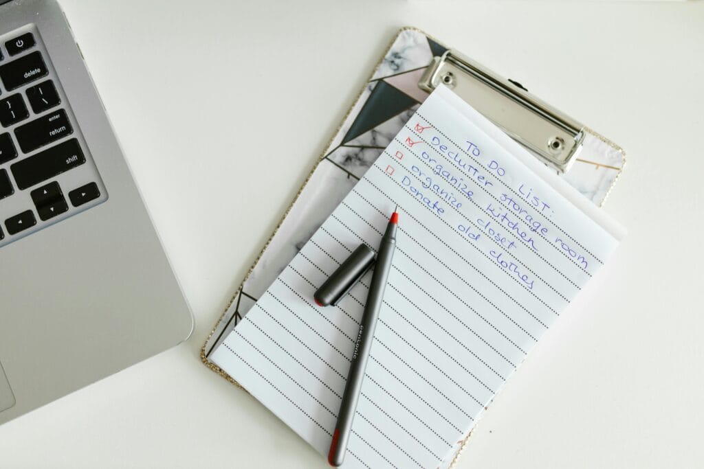 Printed California freelancer tax deadline checklist on a desk with a pen